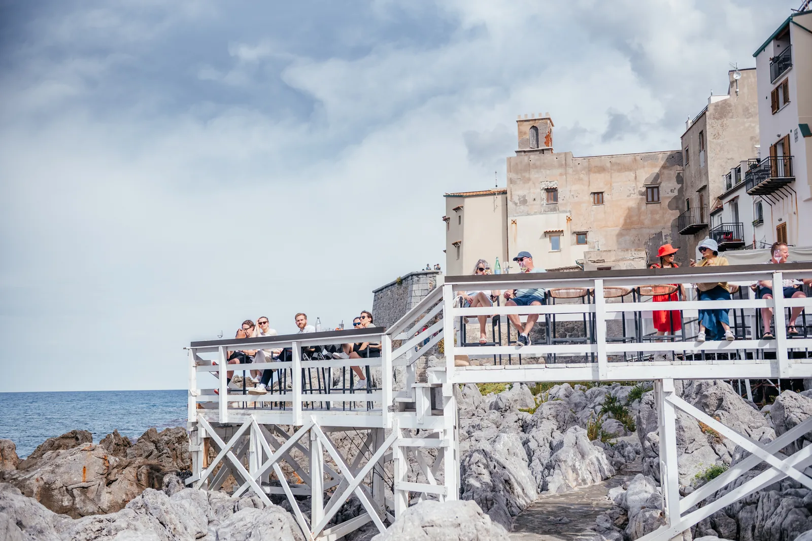 Wooden bathing platform built onto the rocks east of the old town