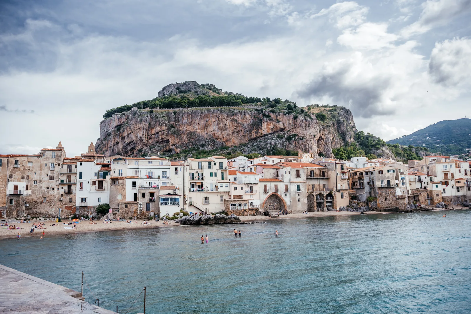 The old town waterfront and La Rocca seen from offshore