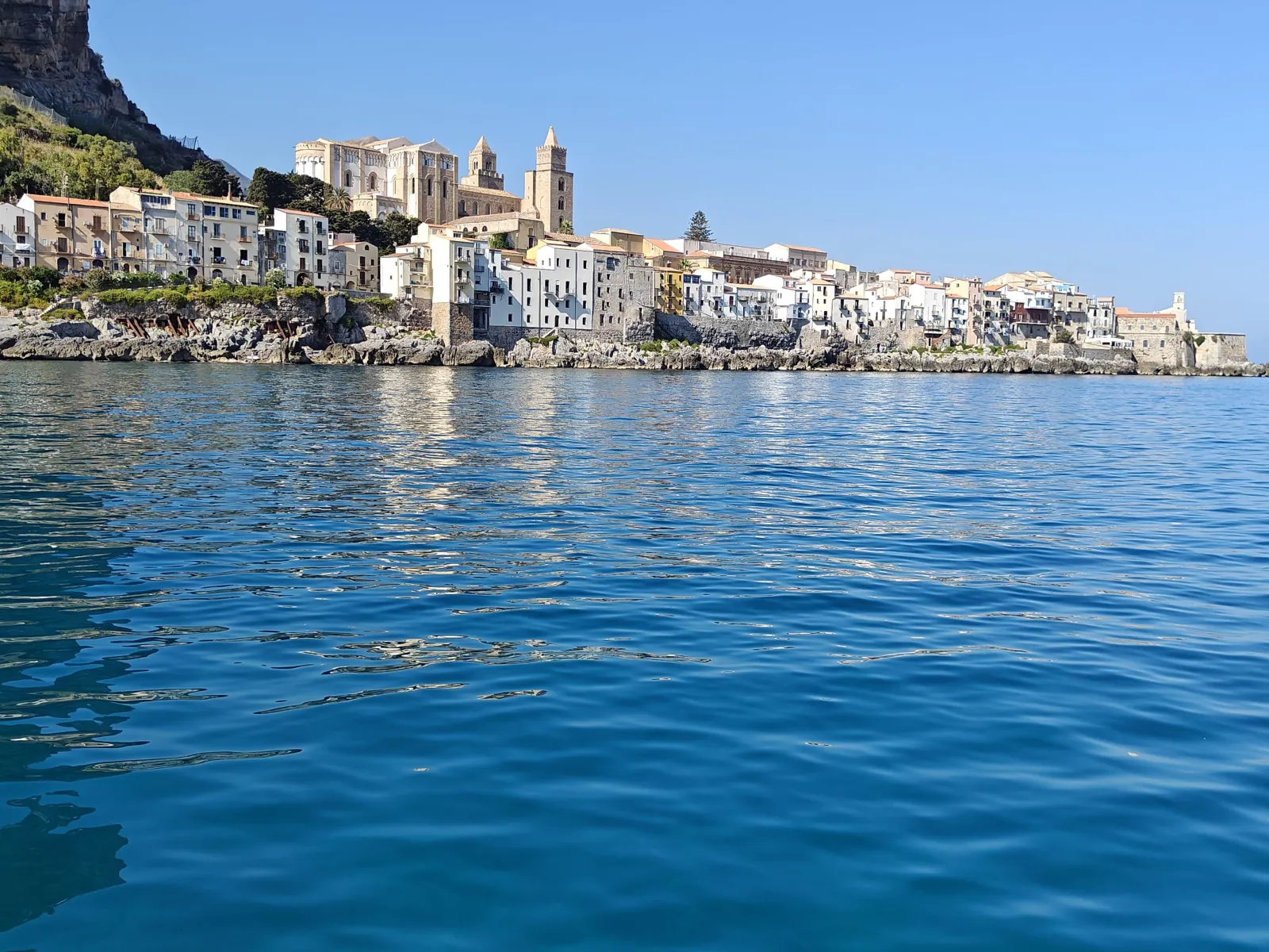 Cefalù's old town and cathedral seen from the water on the run back to the harbour
